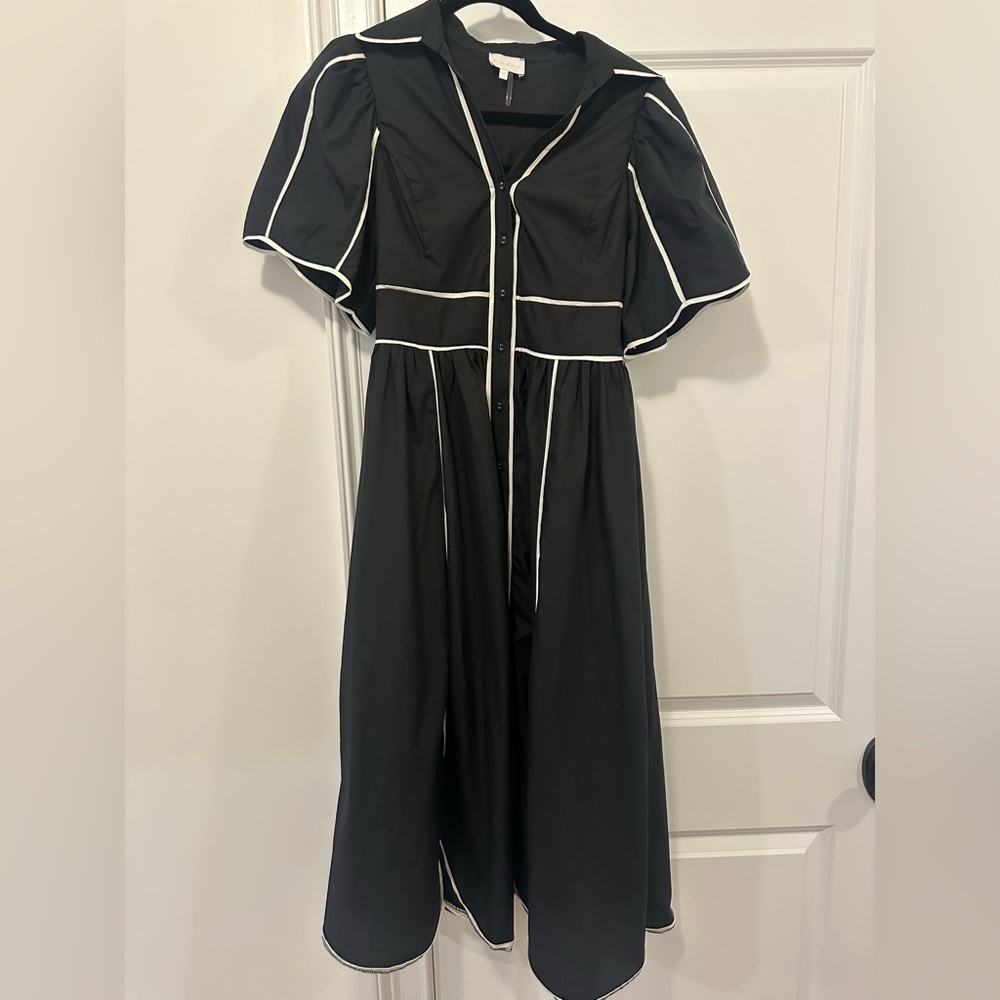 Elegant Black Dress with White Trim